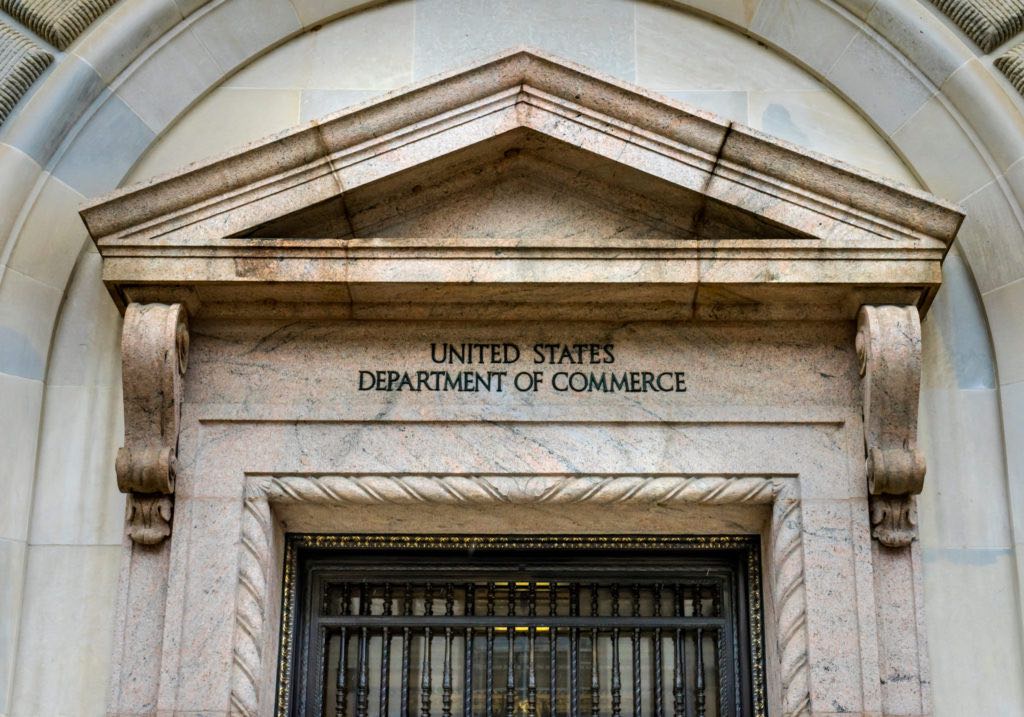 Main Entrance Herbert Hoover Building Commerce Department 14th Street Washington DC.  Building completed in 1932.  Across from the White House, Commerce has multiple departments.